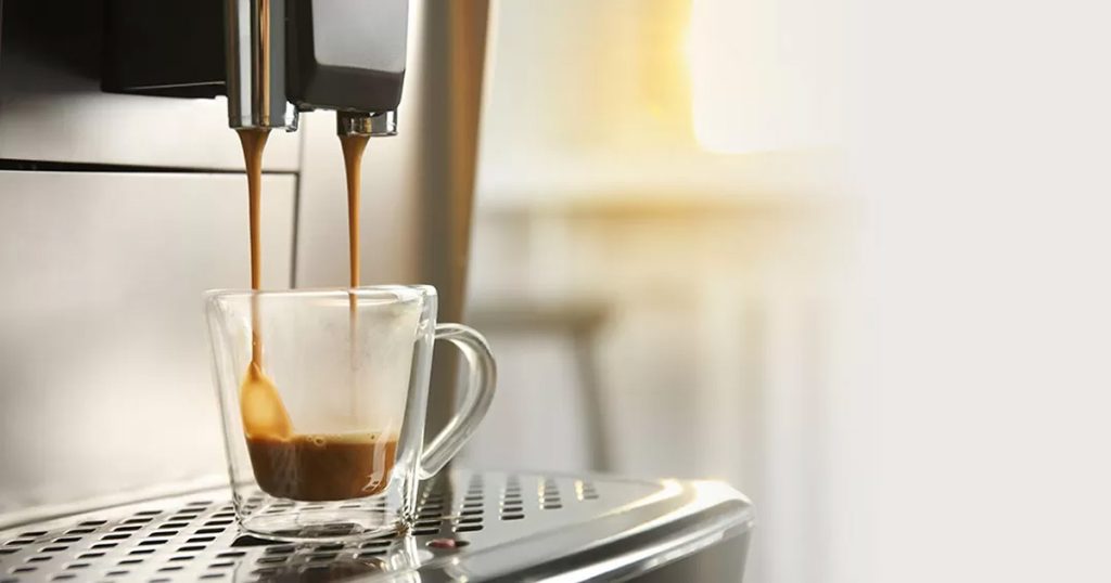 automatic coffee machine pouring espresso